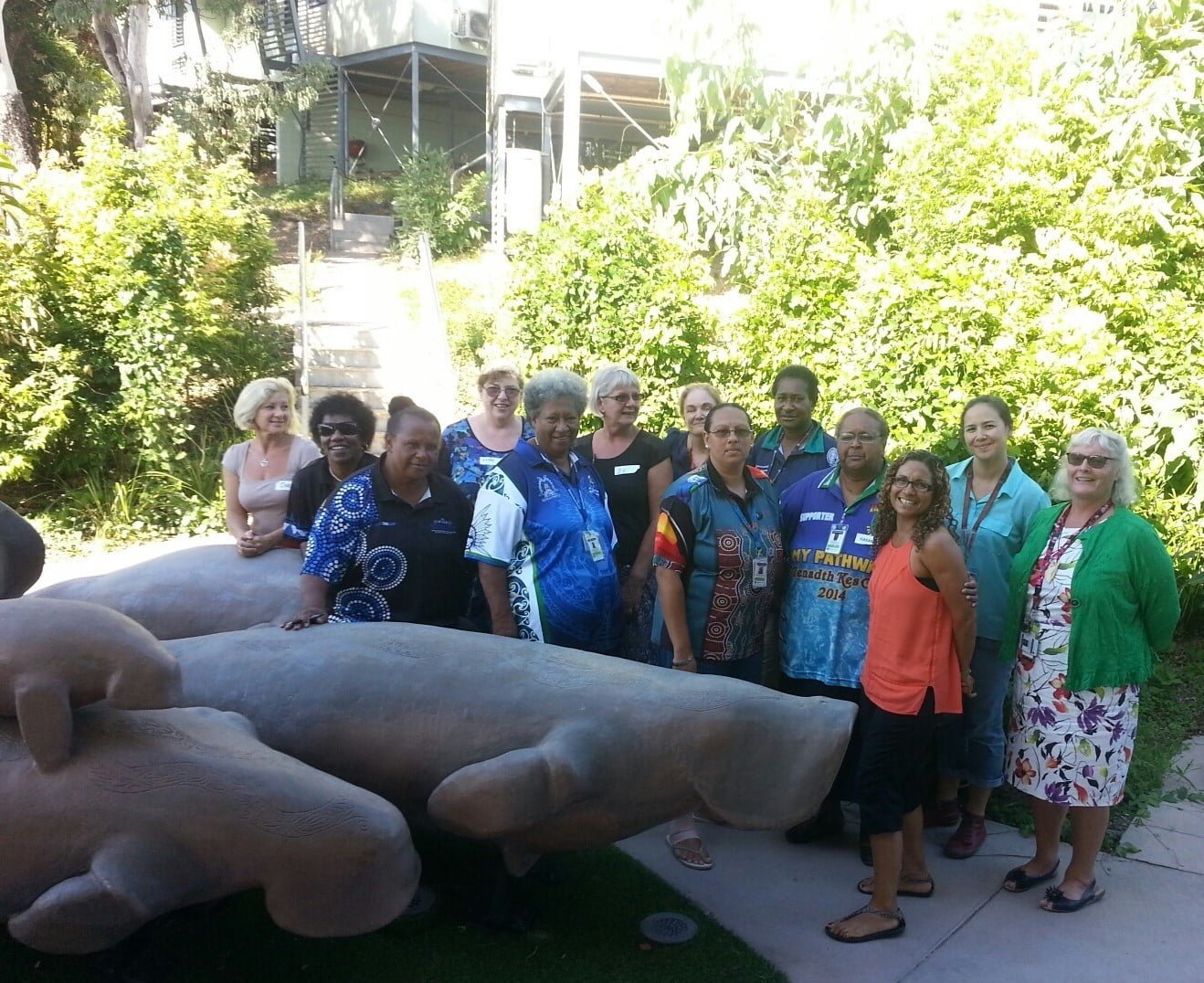 Members of the St. John of God Social Outreach Connected Parenting team gathered outside and smiling
