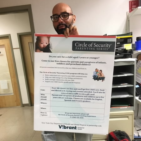 A man holding a Circle of Security questionnaire