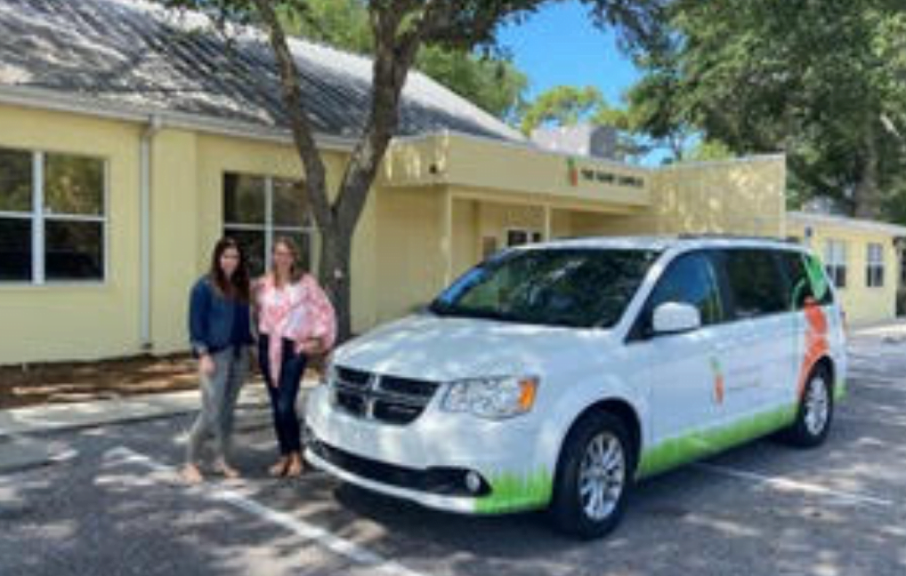 Tesha Clark and Wendy Norman standing in front of the Forty Carrots headquarters
